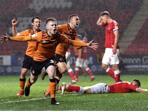 Last-gasp own goal rescues point for Hull at Charlton