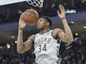 Milwaukee Bucks forward Giannis Antetokounmpo (34) dunks a basket in the fourth quarter during the game against the Cleveland Cavaliers at Fiserv Forum on December 15, 2019