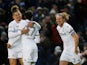 Leeds United's Helder Costa celebrates with teammates after he scored their first goal on December 14, 2019