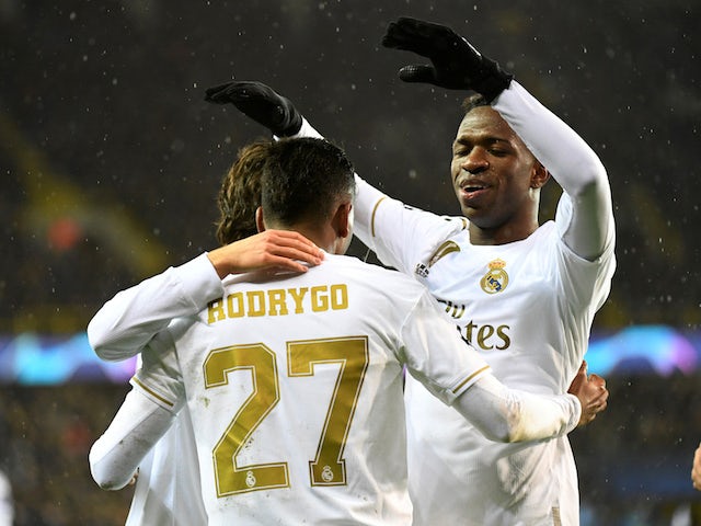 Real Madrid's Rodrygo celebrates scoring their first goal with Vinicius Junior on December 11, 2019