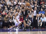  LA Clippers forward Kawhi Leonard (2) controls a ball as Toronto Raptors guard Kyle Lowry (7) tries to defend during the third quarter at Scotiabank Arena on December 12, 2019