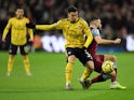 Arsenal's Gabriel Martinelli in action with West Ham United's Robert Snodgrass in the Premier League on December 9, 2019