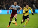 West Ham United's Ryan Fredericks in action with Arsenal's Gabriel Martinelli in the Premier League on December 9, 2019