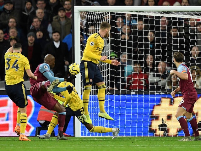 West Ham United's Angelo Ogbonna scores against Arsenal in the Premier League on December 9, 2019