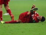 Liverpool's Alex Oxlade-Chamberlain down injured on December 22, 2019