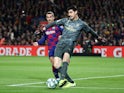 Barcelona's Antoine Griezmann in action with Real Madrid's Thibaut Courtois in La Liga at Camp Nou on December 18, 2019