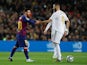 Barcelona's Lionel Messi in action with Real Madrid's Karim Benzema in La Liga at Camp Nou on December 18, 2019)