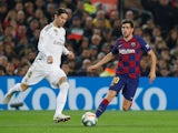 Barcelona's Sergi Roberto in action with Real Madrid's Sergio Ramos in La Liga at Camp Nou on December 18, 2019