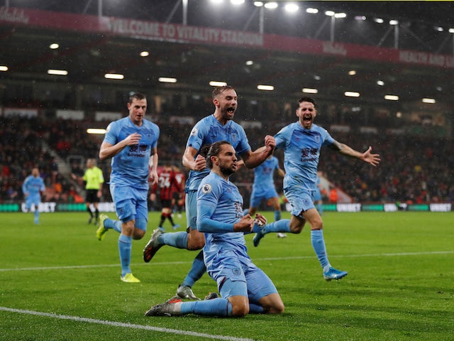 Burnley's Jay Rodriguez celebrates scoring their first goal with teammates on December 21, 2019