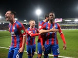 Crystal Palace's Wilfried Zaha celebrates scoring their first goal with teammates on December 16, 2019
