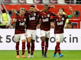 Flamengo's Giorgian de Arrascaeta celebrates scoring their first goal with teammates on December 17, 2019