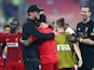 Jurgen Klopp celebrates with his players after Liverpool win the Club World Cup on December 21, 2019