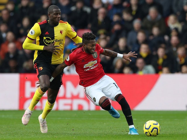 Watford's Abdoulaye Doucoure in action with Manchester United's Fred in the Premier League on December 22, 2019