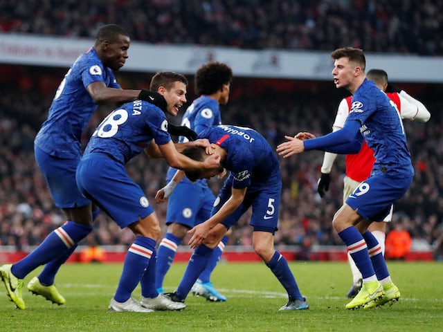 Jorginho celebrates scoring the equaliser with Chelsea teammates on December 29, 2019