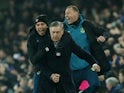 Everton manager Carlo Ancelotti celebrates their first goal scorted by Everton's Dominic Calvert-Lewin with coach Duncan Ferguson and assistant manager Davide Ancelotti on December 26, 2019