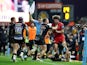 Exeter's Sam Simmonds and Nic White and Saracens' Duncan Taylor are involved in a fight on December 29, 2019