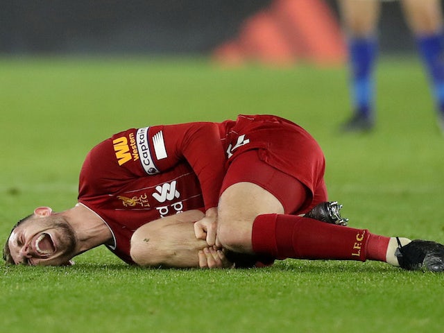 Liverpool captain Jordan Henderson lies injured on December 26, 2019