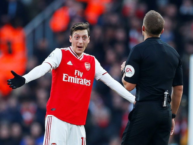 Arsenal playmaker Mesut Ozil remonstrates with the referee on December 29, 2019