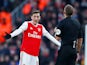 Arsenal playmaker Mesut Ozil remonstrates with the referee on December 29, 2019
