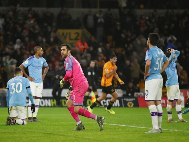Manchester City's Claudio Bravo reacts after Wolverhampton Wanderers' Raul Jimenez scores their second goal on December 27, 2019