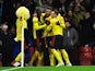 Watford's Troy Deeney celebrates scoring their second goal with teammates on December 28, 2019