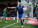 Rochdale's Aaron Wilbraham celebrates scoring their first goal on January 4, 2020