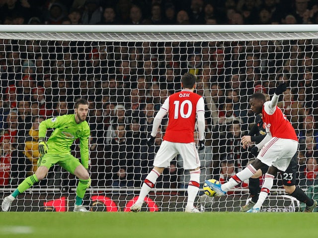Arsenal's Nicolas Pepe scores against Manchester United in the Premier League on January 1, 2020