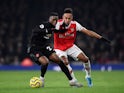 Arsenal's Pierre-Emerick Aubameyang in action with Manchester United's Aaron Wan-Bissaka in the Premier League on January 1, 2020