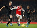 Arsenal's Alexandre Lacazette in action with Manchester United's Nemanja Matic in the Premier League on January 1, 2020