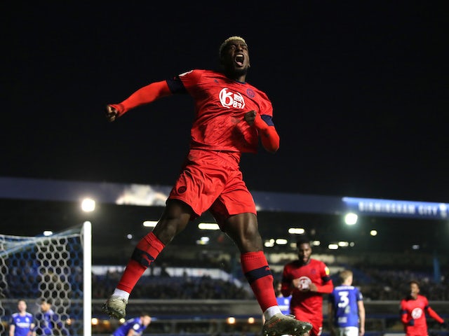 Wigan Athletic's Cedric Kipre celebrates after scoring their third goal on January 1, 2020