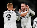 Derby Country's Martyn Waghorn celebrates scoring their second goal with Wayne Rooney on January 2, 2019