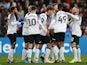 Derby County's Chris Martin celebrates scoring their first goal with Wayne Rooney and teammates on January 5, 2020