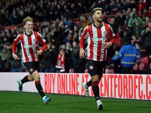 Brentford's Emiliano Marcondes celebrates scoring their first goal on January 4, 2020