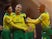 Norwich City's Adam Idah celebrates scoring their third goal with Ibrahim Amadou and Jamal Lewis on January 4, 2020