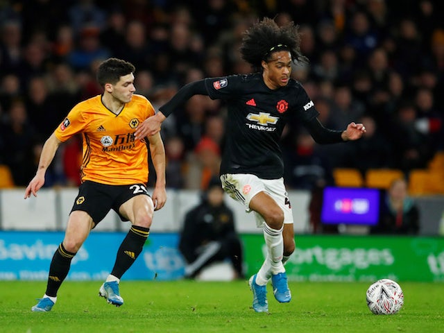 Manchester United's Tahith Chong in action with Wolverhampton Wanderers's Ruben Vinagre in the FA Cup on January 4, 2020