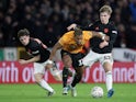 Manchester United's Brandon Williams in action with Wolverhampton Wanderers's Adama Traore in the FA Cup on January 4, 2020