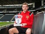 Alex Gilbey poses with his League One Player of the Month award for December 2019