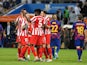 Atletico Madrid's Kieran Trippier celebrates with Thomas Partey and teammates after the match on January 9, 2020