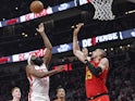 Houston Rockets guard James Harden (13) shoots over Atlanta Hawks center Alex Len (25) during the first half at State Farm Arena on January 9, 2020