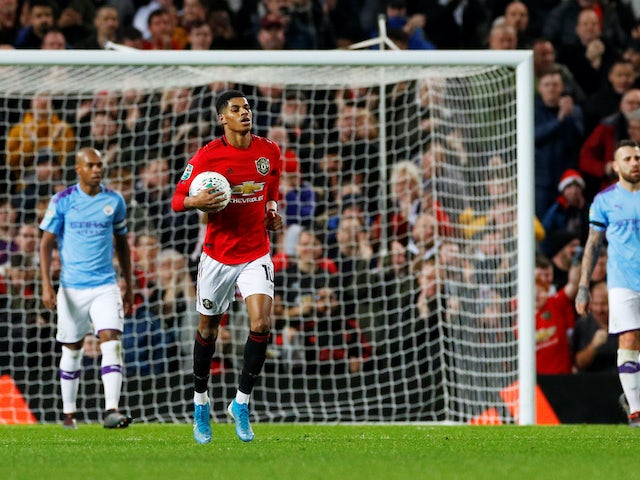 Marcus Rashford celebrates pulling one back during the EFL Cup game between Manchester United and Manchester City on January 7, 2020