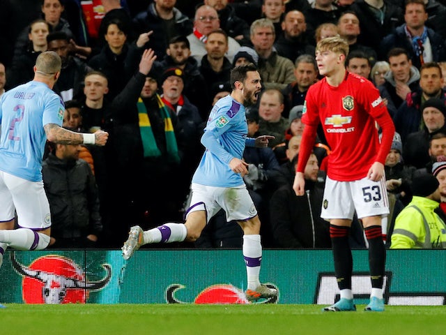 Bernardo Silva celebrates scoring the opener during the EFL Cup game between Manchester United and Manchester City on January 7, 2020