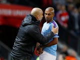 Pep Guardiola gives instructions to Fernandinho during the EFL Cup game between Manchester United and Manchester City on January 7, 2020