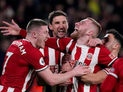 Sheffield United's Oliver McBurnie celebrates scoring their first goal with Chris Basham, John Lundstram and George Baldock on January 10, 2020