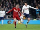 Jordan Henderson and Son Heung-min in action during the Premier League game between Tottenham Hotspur and Liverpool on January 11, 2020