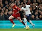 Andy Robertson and Serge Aurier in action during the Premier League game between Tottenham Hotspur and Liverpool on January 11, 2020