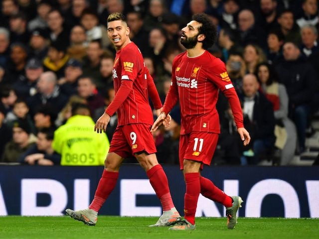 Roberto Firmino celebrates opening the scoring during the Premier League game between Tottenham Hotspur and Liverpool on January 11, 2020