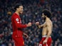 Virgil van Dijk and Mohamed Salah celebrate Liverpool's win over Manchester United in the Premier League on January 19, 2020.