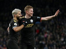 Manchester City's Kevin De Bruyne and Sergio Aguero embrace on January 12, 2020