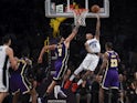 Orlando Magic guard Markelle Fultz (20) shoot a layup past Los Angeles Lakers center JaVale McGee (7) during the second half at Staples Center on January 16, 2020
