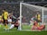 Aston Villa's Douglas Luiz celebrates scoring their first goal with teammates as Watford's Ben Foster falls into the net on January 21, 2020
